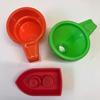 Cups, boat and funnel (colours may vary) Image