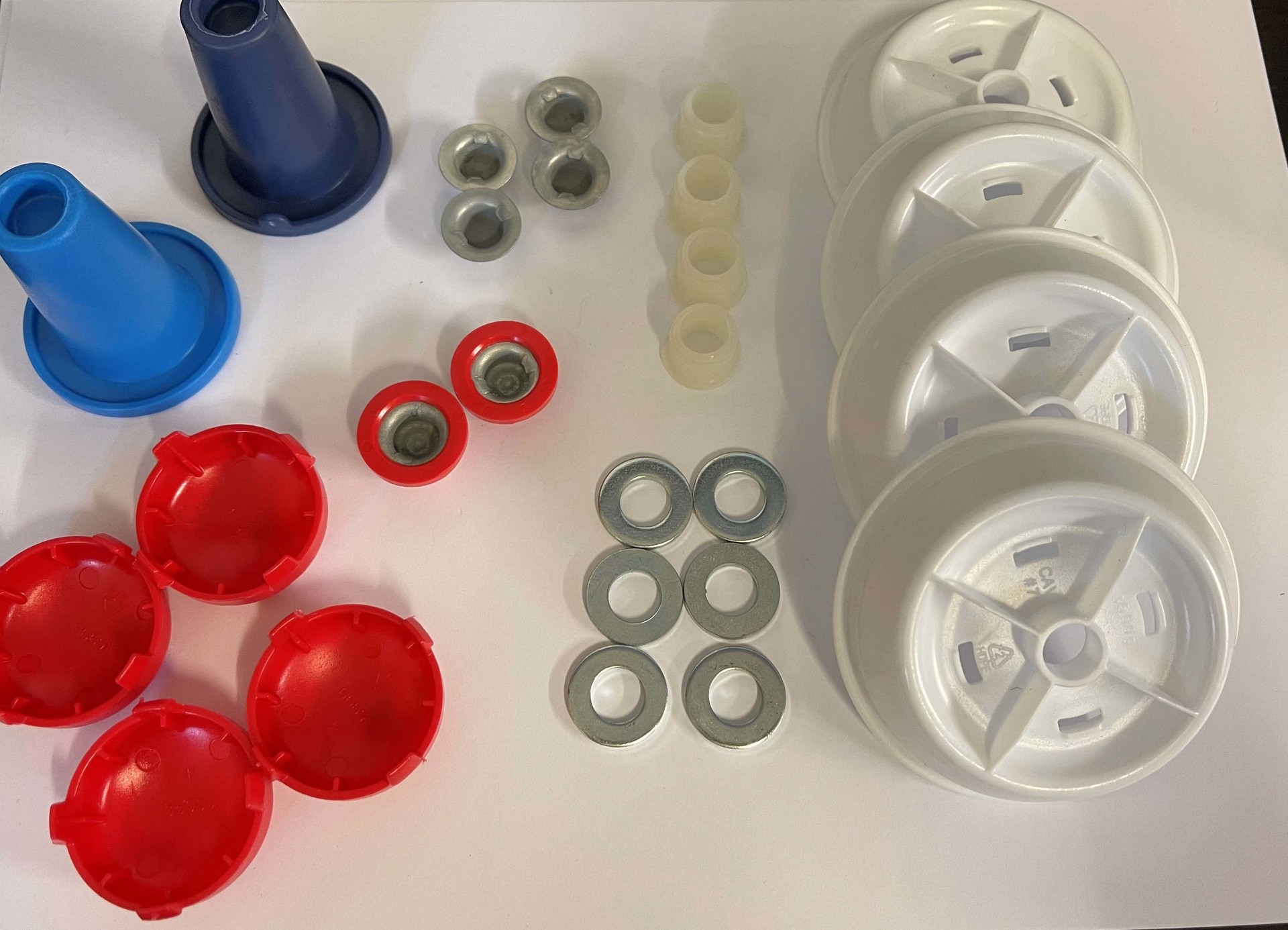 7cm Wheel Fixing Kit (inc End cap x2, UU Metal Cap x 4, washer x 6, white top hat bush x 4, 4 x hub cap, 4 x centre cap, tool x2 Image